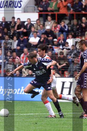 16 mei 1999
Fernando Ricksen in duel met Ruud v Nistelrooy
PSV-AZ 7-1