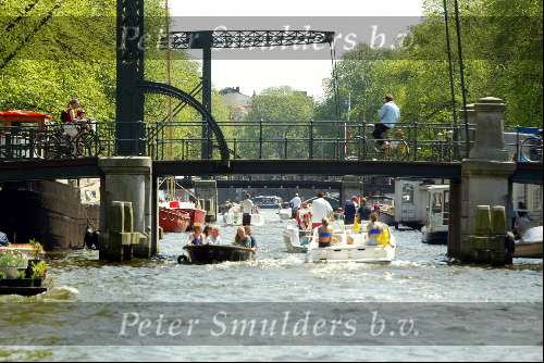 Oude panden aan grachten van Amsterdam
Sloepenroute
Veel plezierbootjes