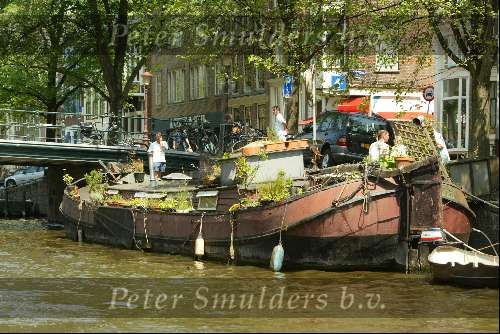 Woonboot aan grachten van Amsterdam
Sloepenroute