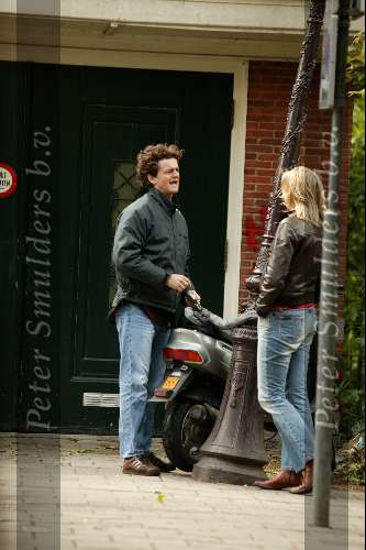 Amsterdam 3 mei 2003
kaper v kooten bij z\\\'n scooter met zijn vriendin