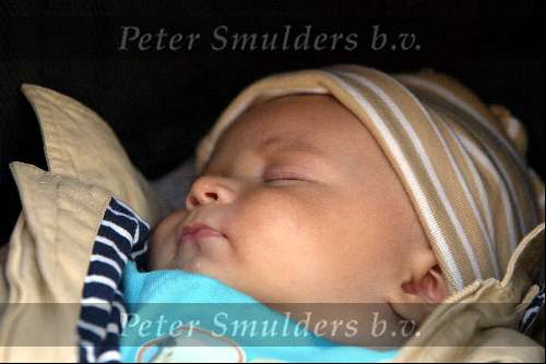 Amsterdam 7 mei 2003
Peter Faber met zijn vrouw en zoontje achter de kinderwagen
