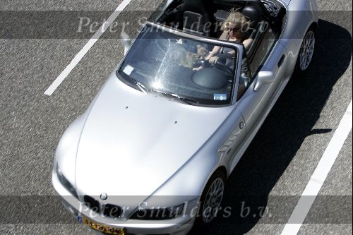 Amsterdam 19 mei 2004
Bridget Maasland in haar BMW cabrio.