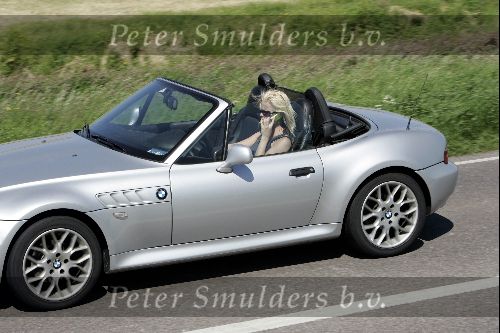 Amsterdam 19 mei 2004
Bridget Maasland in haar BMW cabrio met gsm