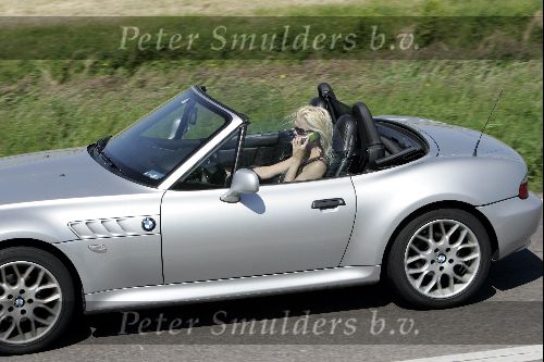 Amsterdam 19 mei 2004
Bridget Maasland in haar BMW cabrio met gsm