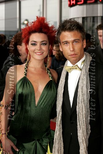 Rotterdam  10 mei 2004
Uitreiking Musical Awards in nieuw Luxor.
Kim Lian v d Weij met sexy jurk en vriend