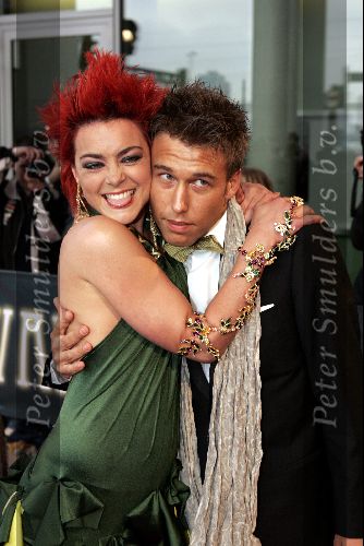 Rotterdam  10 mei 2004
Uitreiking Musical Awards in nieuw Luxor.
Kim Lian v d Weij met sexy jurk en vriend