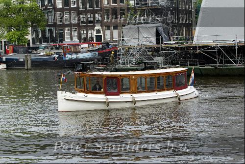 Amsterdam 2 mei 2004
Matt Damon met vriendin in rondvaartboot.