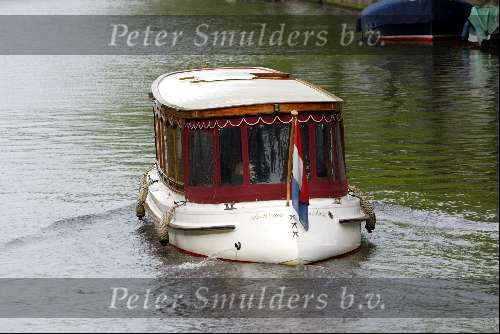 Amsterdam 2 mei 2004
Matt Damon met vriendin in rondvaartboot.