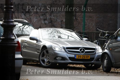 Amsterdam 29 oktober 2009
Robert jensen en Jan Paparazzi op terras en in de mercedes cabrio van Robert.
Peter Smulders bv