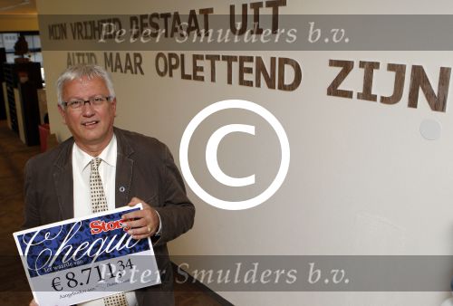 Amersfoort 13 oktober 2011
Hr Bert Kuipers van het diabetes fonds met cheque van Story.
Peter Smulders bv