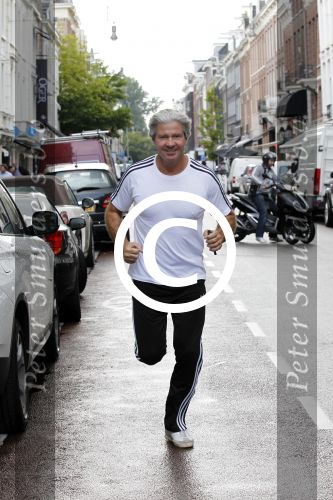 Amsterdam 21 juli 2011
Dries Roelvink hard lopend op de pc hooftstraat.
Peter Smulders bv
