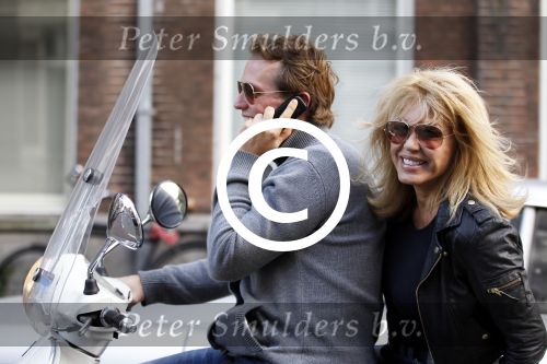 Amsterdam 4 oktober 2011
Patricia Paay en vriend Nicky v Dam op vespa scooter.
Peter Smulders bv