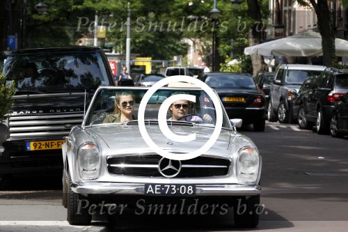 Amsterdam 20 augustus 2011
Wesly Bronkhorst met zijn vriendin Renee Gunning in Mercedes cabrio.
Peter Smulders bv