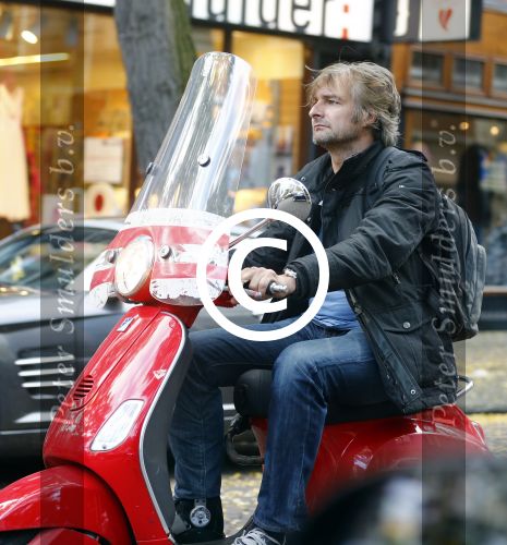 Amsterdam 23 oktober 2013
Victor Reinier op zijn vespa scooter.