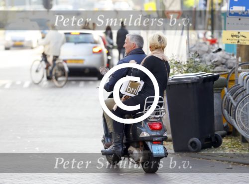 Amsterdam 1 november 2014
Caroline Tensen met haar man Ernst Jan Smids op hun vespa scooter.
