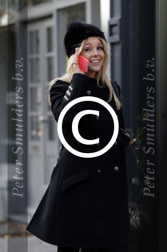 Amsterdam 13 november 2015 
Chantal janzen bellend op straat.