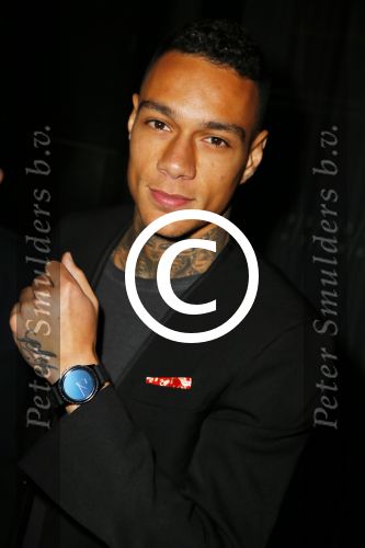 Amsterdam 9 n ovember 2015
Life after football LAF gala in het INK hotel. Gregory v d Wiel met zijn samsung BLAR. horloge