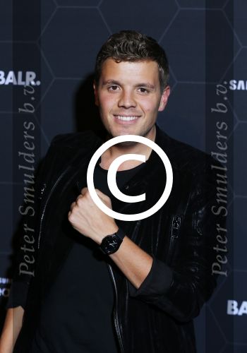 Amsterdam 29 oktober 2015 
Presentatie nieuwe samsung smart watch in samenwerking met BALR. in the harbour club.
Kim Kotter met Jaap Reesema