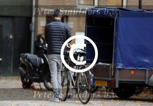 Amsterdam 20 oktober 2015 
Rolf Snoeren op de fiets in Amsterdam.