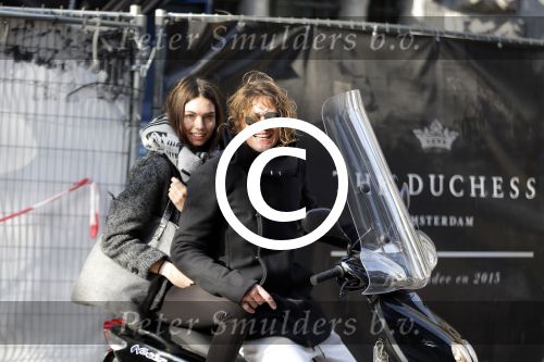 Amsterdam 2 november 2015
Tygo Gernandt met zijn nieuwe vriendin Annewil Hokken op de scooter