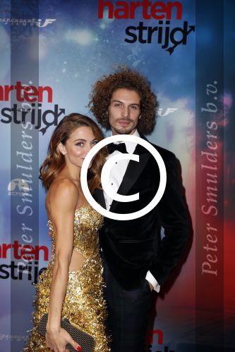 Amsterdam 24 oktober 2016
Premiere Hartenstrijd in Tuschinski. Georgina Verbaan met vriend Bram v Leeuwen