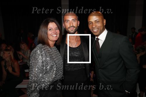 Amsterdam 3 oktober 2019
Modeshow Tommy Driessen in hotel Krasnapolsky. Humberto Tan met zijn vrouw ineke en partner Tommt