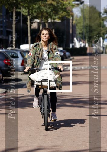 Amsterdam 22 september 2021
Quinty Trustfull op haar electrische van Moof fiets.