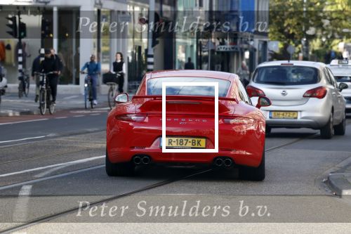Amsterdam 26 oktober 2022
Bram Moszkowicz in zijn rode porsche 911 in Amsterdam centrum.