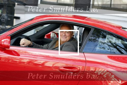 Amsterdam 26 oktober 2022
Bram Moszkowicz in zijn rode porsche 911 in Amsterdam centrum.