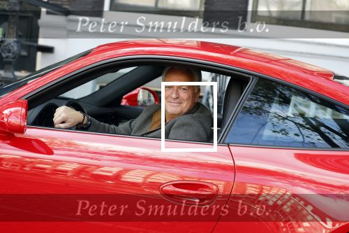 Amsterdam 26 oktober 2022
Bram Moszkowicz in zijn rode porsche 911 in Amsterdam centrum.