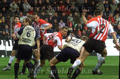 Eindhoven, 12 november 2000
PSV-Feyenoord, eindstand 1-0 door penalty van Arnold Bruggink
Paul Bosvelt-Ramzi-Kevin Hofland-Ulrich v Gobbel-Jurgen Dirkx