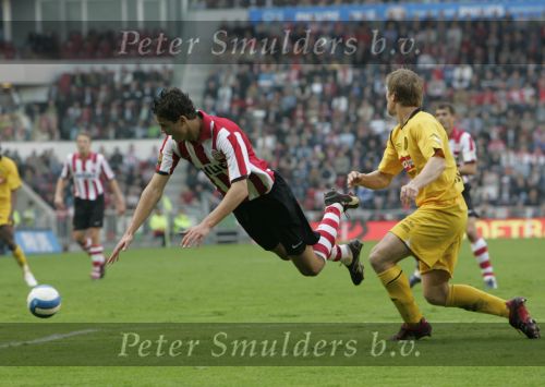 Eindhoven, 20 Oktober 2006 
Kompetitiewedstrijd PSV-Roda JC Seizoen 2006/2007
Eindstand 4-1
Ibrahim Afellay wordt onderuit gehaald door Marcel de Jong