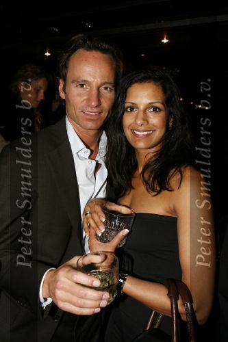 Amsterdam 30 september 2006
feestje A1 grand prix in club Onassis.
Michael Lingg met zijn nieuwe vriendin