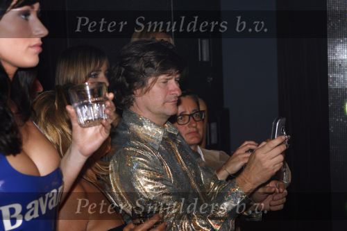 Amsterdam 30 september 2006
Openingsfeest A1 grand Prinx in Onassis.
Optreden Dani Minoque. Rob Muntz met gsm
