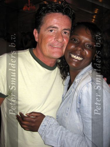 Haarlem 5 augustus 2006
Johnny Kraaykamp jr met zijn vriendin Sophia Ojienda op Harlem Culinair.
