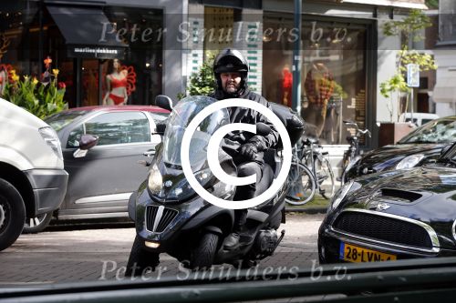 Amsterdam 25 september 2012
Ferry de Kok op MP3 motor.
Peter Smulders bv