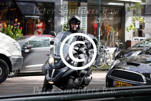 Amsterdam 25 september 2012
Ferry de Kok op MP3 motor.
Peter Smulders bv