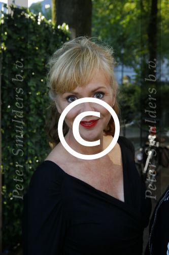 Amsterdam 30 september 2015 
Manon Thomas met vriend bij boekpresentatie Joop v Tellingen