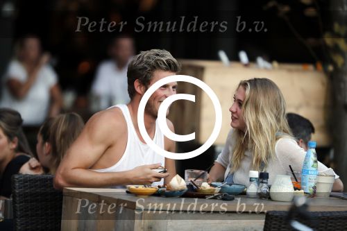 Amsterdam 12 september 2016 
Tim Douwsma en zijn vriendin Jessie Jazz Vuijk op terras en op de scooter