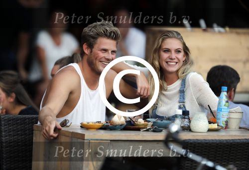 Amsterdam 12 september 2016 
Tim Douwsma en zijn vriendin Jessie Jazz Vuijk op terras en op de scooter