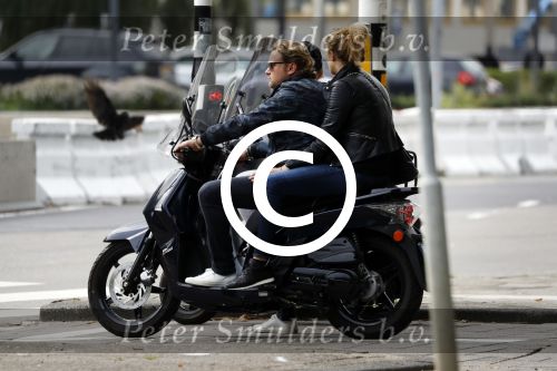 Amsterdam 17 september 2016
Wesly Bronkhorst met zijn vriendin Renee Gunning op de scooter