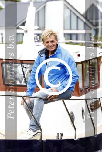 Henny Huisman op zijn boot