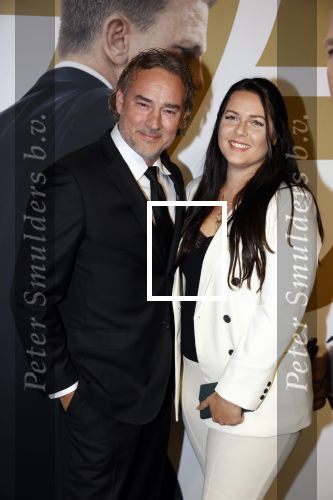 Amsterdam 28 september 2021
Premiere James Bond in Tuschinski. Jeroen Nieuwenhuize met zijn vriendin Tessa Kortlevers