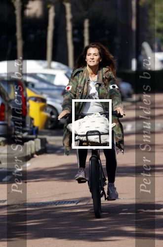 Amsterdam 22 september 2021
Quinty Trustfull op haar electrische van Moof fiets.