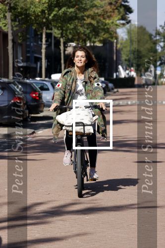 Amsterdam 22 september 2021
Quinty Trustfull op haar electrische van Moof fiets.