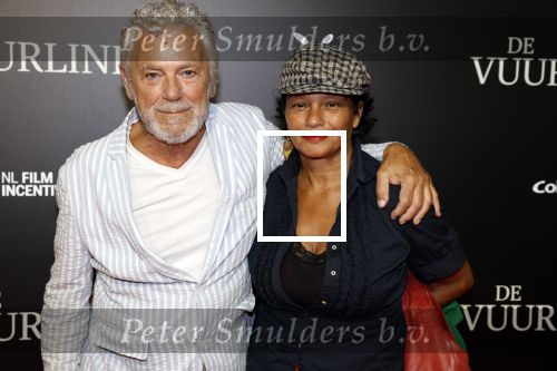 Amsterdam 11 september 2023
Premiere de Vuurlinie in Thuschinski Amsterdam .  Hans Dagelet en partner Esther Apituley