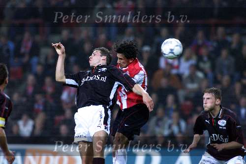 Eindhoven 14 oktober 2000
PSV-NEC 0-0
Ramzi in duel met Peter Wisgerhof
Kopbal  mooie aktie