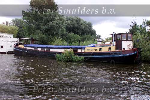 24 Juli Amsterdam
Oud vrachtschip als Woonboot aan de amstel
Sloepenroute