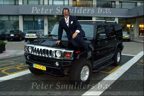 Amsterdam 2 oktober 2003
Emile Ratelband op zijn Hummer Automobiel