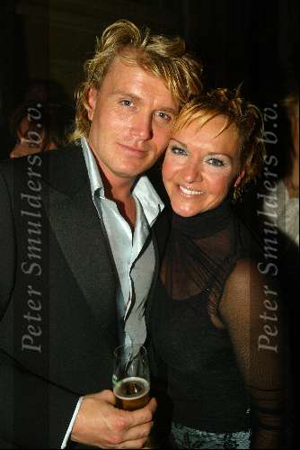 Amsterdam 6 oktober 2003
Beau Monde Awards 
Hans Klok met een glas champagneen Mariska v Kolck